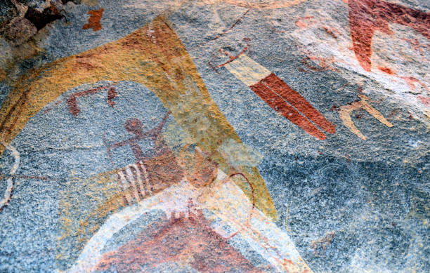 Laas Geel cave paintings - wings and people on a ceiling, Somaliland, Somalia Laas Geel / Laas Gaal, Dubato, Maroodi Jeex region, Somaliland, Somalia: cave paintings located in a red granite rock massif near Hargeisa - some of the earliest and best-preserved art works known in the Horn of Africa and on the African continent as a whole, suggested dates vary between 4000 BC and 3000 BC - wings, cow and man with dog. Human figures in Laas Geel have a rather standardized shape: depicted frontally with arms outstretched, and wearing a kind of white shirt, in the images there is one white and one red. hargeysa photos stock pictures, royalty-free photos & images