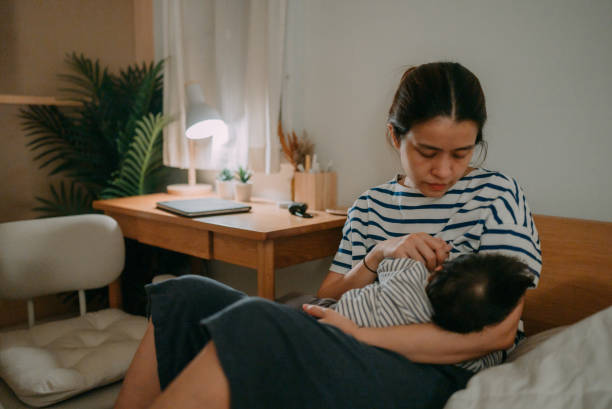 istock A woman breastfeeding her baby. 1319065732