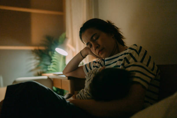 istock Mother breastfeeding baby. 1319065795