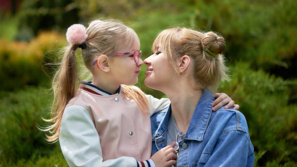 istock Mother and daughter  in the summer park 1319083712