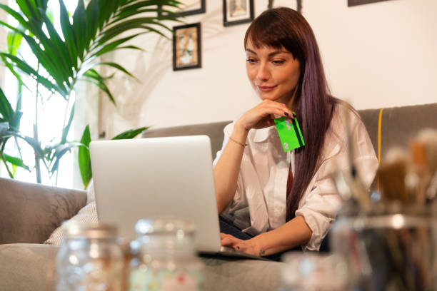 istock Young Woman Online Shopping Laptop 1319085217
