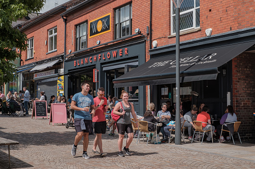 Altrincham, United Kingdom - 19 July, 2020 : City centre of Manchester. People walk in Manchester district.
