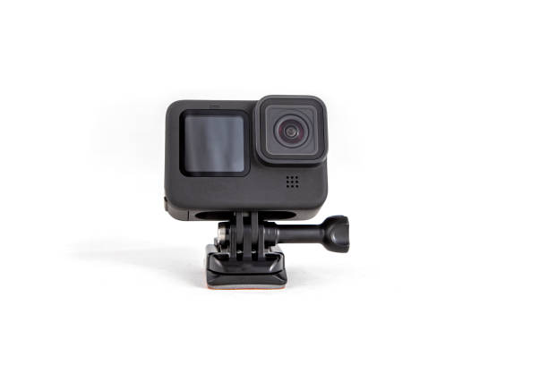 istock New 4K action camera on a suction mount in black color. Isolated white background 1319090938