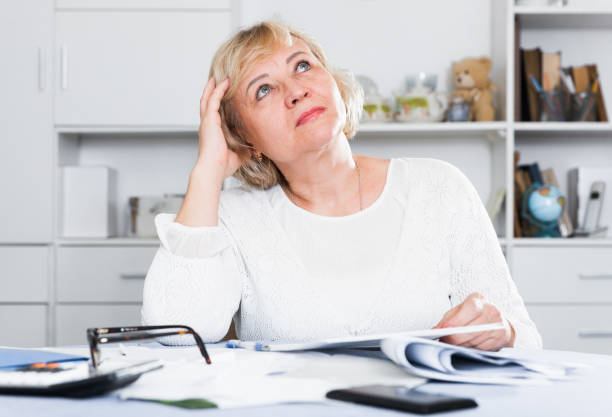 istock Woman engaged in home accounting 1319091492