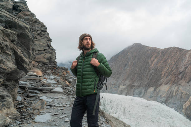 Man looking at glacier in Pakistan