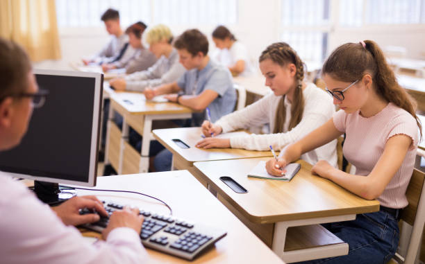 istock Teenage students working at class during lesson 1319094244