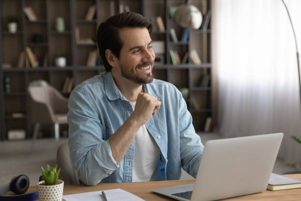 istock Dreamy excited businessman looking to aside, visualizing good future 1319095669