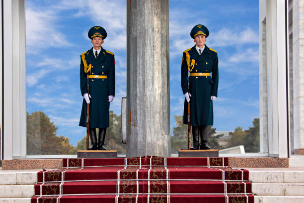 Changing of guard of honor at Moscow Kremlin in winter. Soldiers in military uniform. The famous place is Eternal Flame in memory of those killed in World War II. January 10, 2015 - Moscow, Russia.