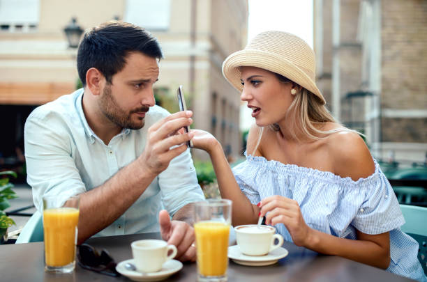 istock Jealousy. Problems in love relationships. Young couple in quarrel 1319098988