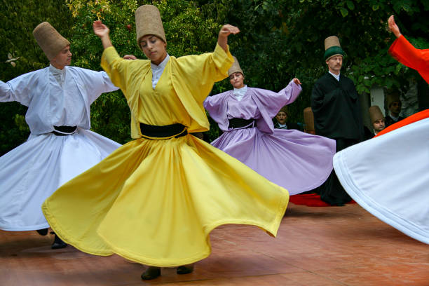 Whirling Dervishes, Istanbul, Turkey Istanbul, Turkey - September 22, 2007: Whirling dervishes during sufi whirling ritual performance known as Sema, in Istanbul, Turkey ceremonial dancing stock pictures, royalty-free photos & images