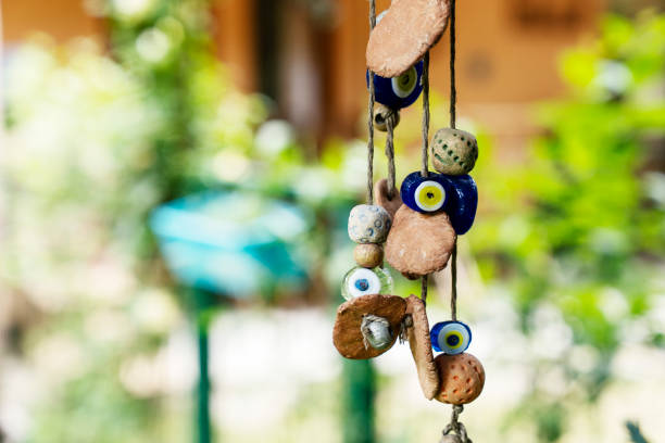 istock Evil Eye Talisman Or Amulet Hanging On A Garden Fence 1319099080