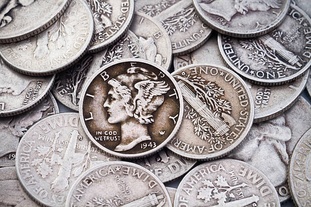 istock Pile of old Silver Dimes & Quarters 131910036