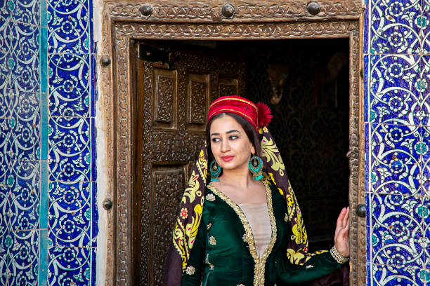 Uzbek woman, Khiva, Uzbekistan Khiva, Uzbekistan - September 24, 2019: Uzbek woman in traditional clothes in Khiva, Uzbekistan samarkand urban stock pictures, royalty-free photos & images