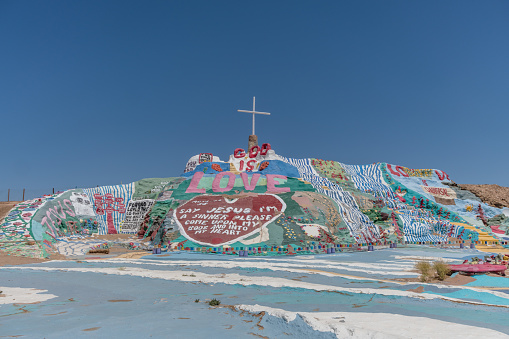 East Jesus, California, USA - May 11th 2021: Scenic painted Salvation Mountain vista