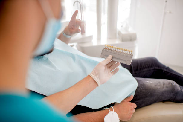 istock Man at the dentist 1319109702