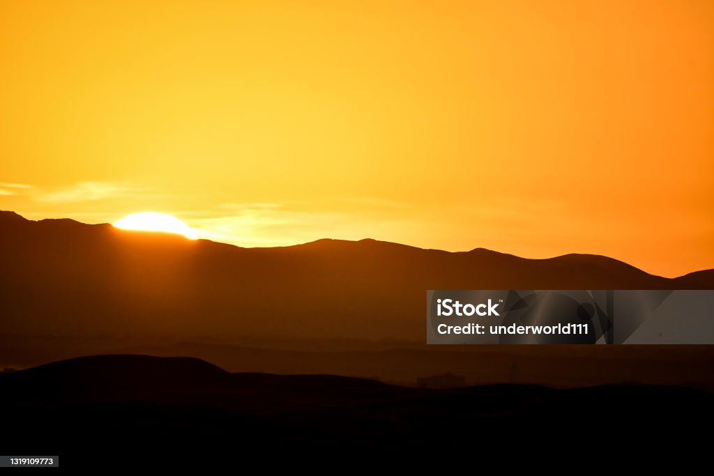 sunset in mountains, photo as background sunset in mountains, beautiful photo digital picture Sahara Desert Stock Photo