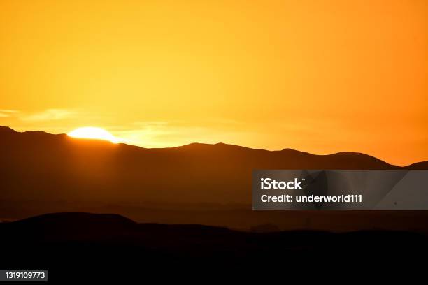 Sunset In Mountains Photo As Background Stock Photo - Download Image Now - Sahara Desert, Sunset, Beauty