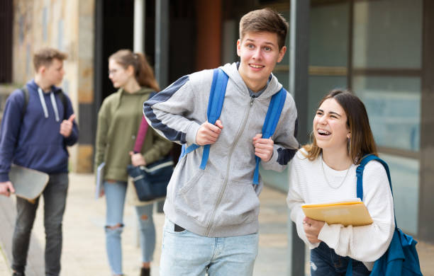 istock Cheerful teenagers talking outside after lessons 1319112315