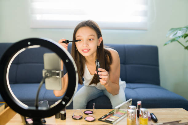 istock Reviewing makeup products for a video 1319112643