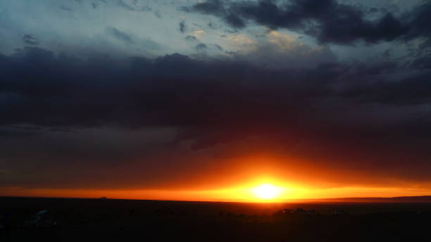 istock sunset over the base camp of autotourists in Mongolia 1319112775