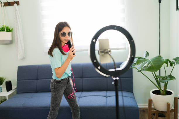 istock Beautiful girl dancing for a viral challenge 1319113699