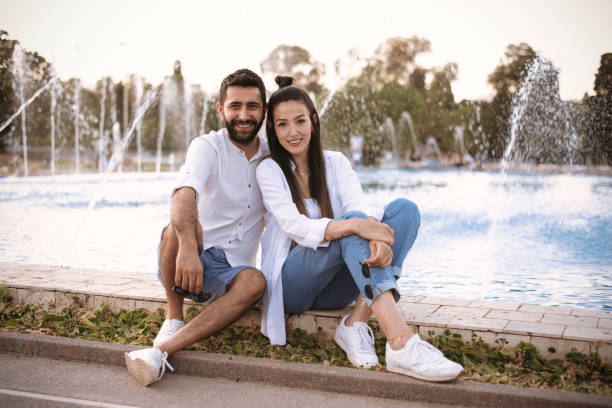 istock Young couple enjoying springtime day in nature 1319114389