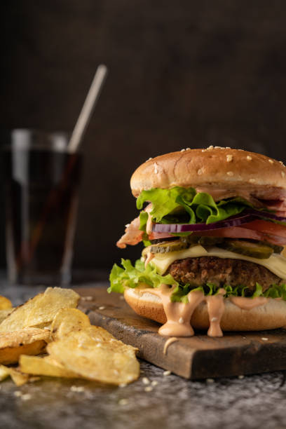 istock juicy burger with beef patty 1319117417