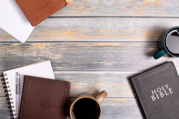 istock A Group of Bibles for a Study with Hot Coffee on a Distressed Wooden Table 1319119309