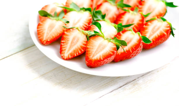 istock Ripe Strawberries in a White Plate. 1319119406