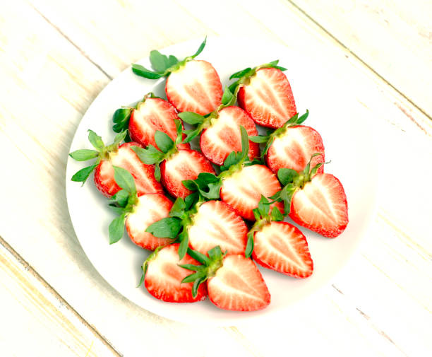 istock Ripe Strawberries in a White Plate. 1319119413