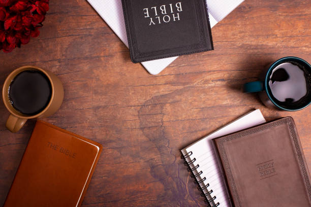 istock Group Bible Study with Hot Coffee on a Distressed Red Wood Table 1319119499