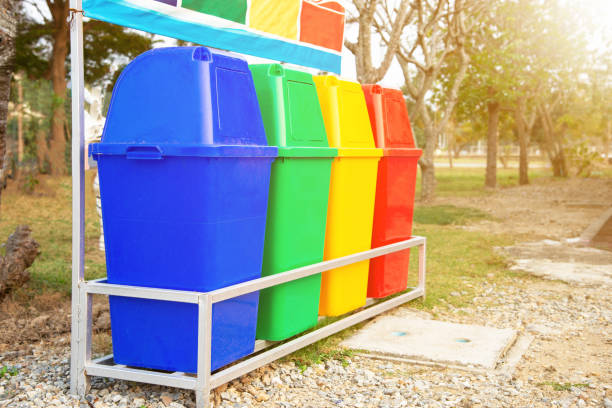 istock Multi-colored bins to separate different types of waste. 1319119689
