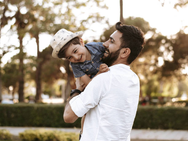 istock Father and son enjoying springtime in nature 1319125053