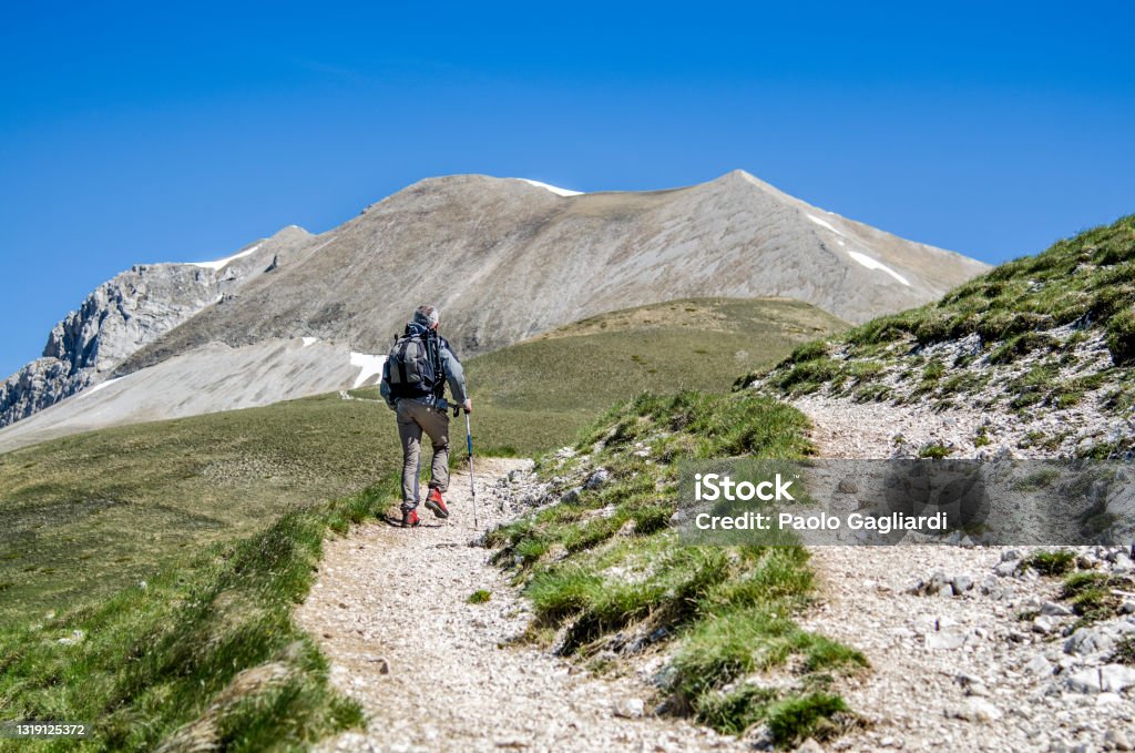 Monte Redentore, Monte Vettore Monti Sibillini, Italy: Trekking to the summit of Mount Vettore Hiking Stock Photo
