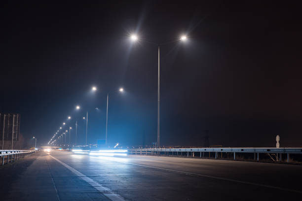 istock traffic on night road 1319125627