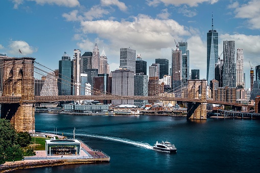 A view of the river and lower Manhattan and the Brooklyn Bridge from the Manhattan Bridge