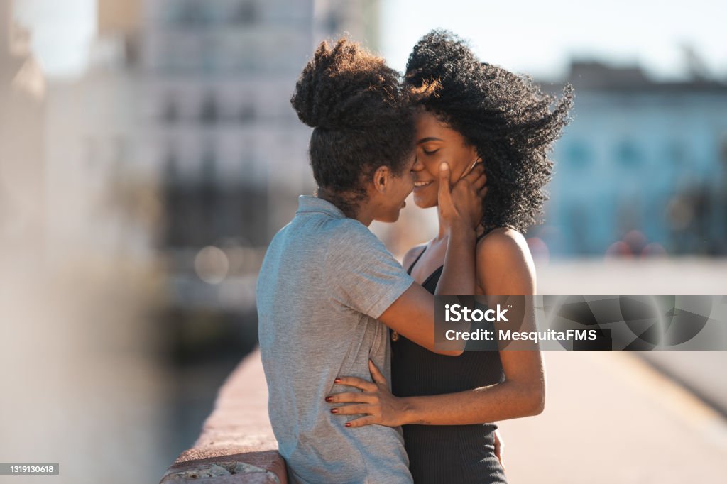 Lesbian couple kissing on the mouth outdoors Only Women, Lesbian, LGBT, Gay Couple, Love Kissing Stock Photo