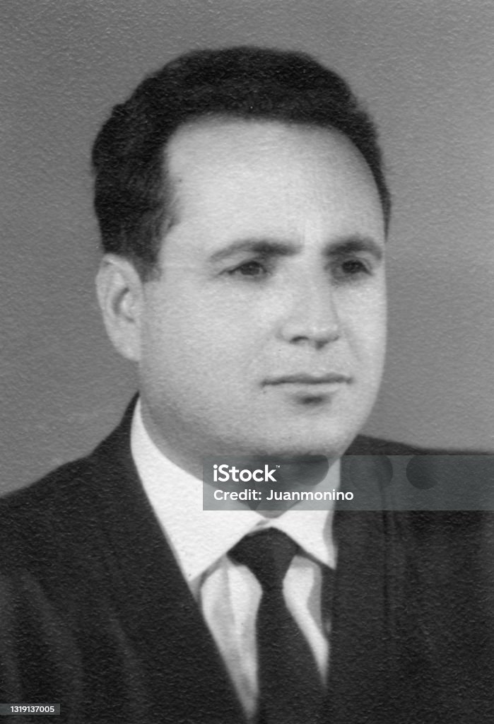 Vintage image portrait, headshot studio photo of a pensive man looking away Men Stock Photo