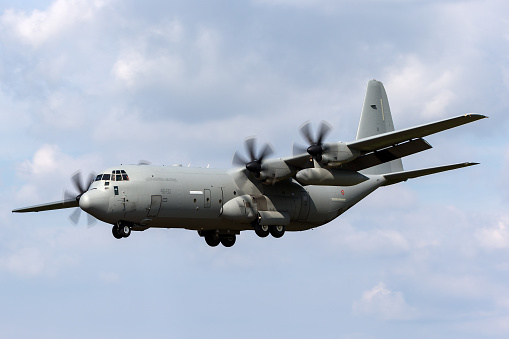 Gloucestershire, UK - July 10, 2014: Italian Air Force Lockheed Martin C-130J-30 Hercules military cargo aircraft on approach to land at RAF Fairford.
