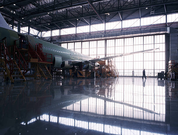 Aircraft assembly line Aircraft assembly line airplane hangar photos stock pictures, royalty-free photos & images