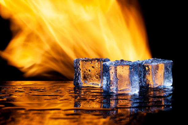 istock water and fire, ice and flame, black background, place under the text 1319143494