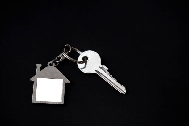 istock House keys with house shaped keychain 1319145348