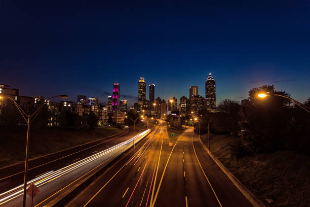 istock Atlanta skyline at twilight with blue sky 1319146219