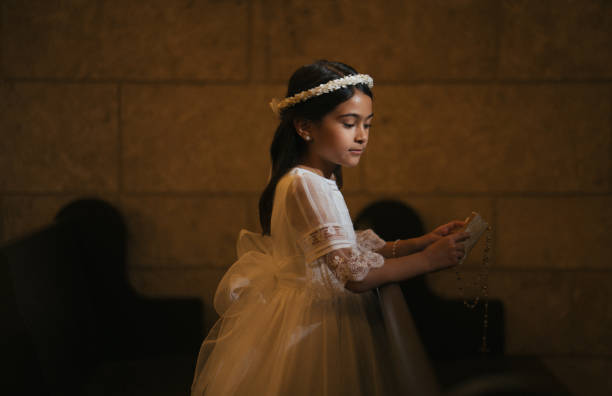 istock First Communion hispanic girl 1319151716