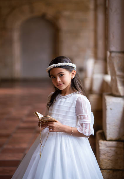 istock First Communion cuban american girl 1319151866