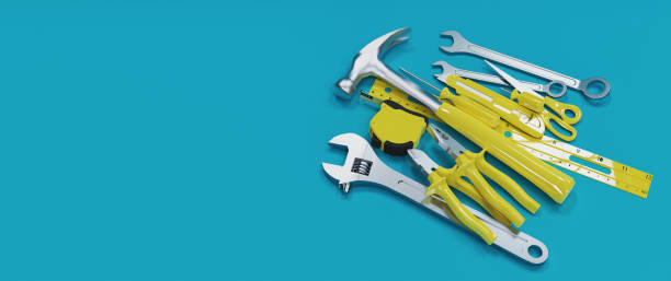istock 3D Render, Many yellow hand tools on blue background, there is space for your ad. 1319156742