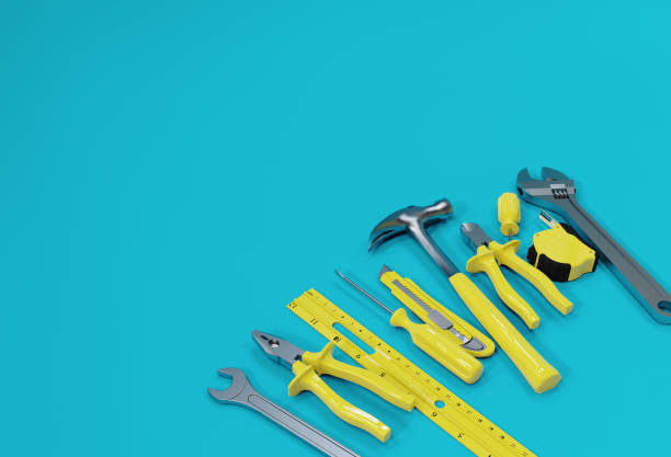 istock 3D Render, Many yellow hand tools on blue background, there is space for your ad. 1319156755