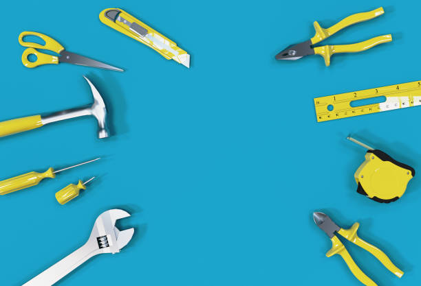 istock 3D Render, Many yellow hand tools on blue background, there is space for your ad. 1319156767