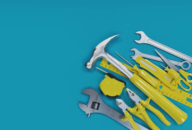 istock 3D Render, Many yellow hand tools on blue background, there is space for your ad. 1319156770
