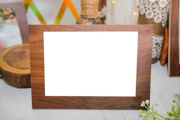 istock Wooden frame in table and flower stock 1319160677